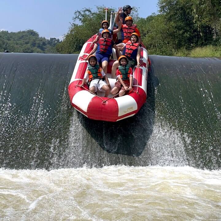 Rafting through a 3-meter-high dam at the Cisadane River, Bogor, West Java,  Indonesia"